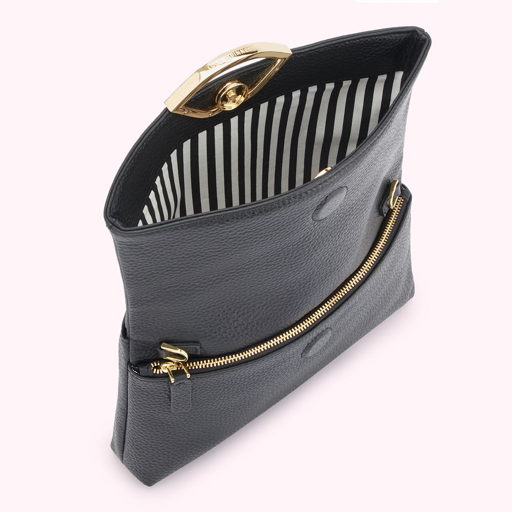 Black pebble leather crossbody bag with gold-tone hardware and black and white striped interior.