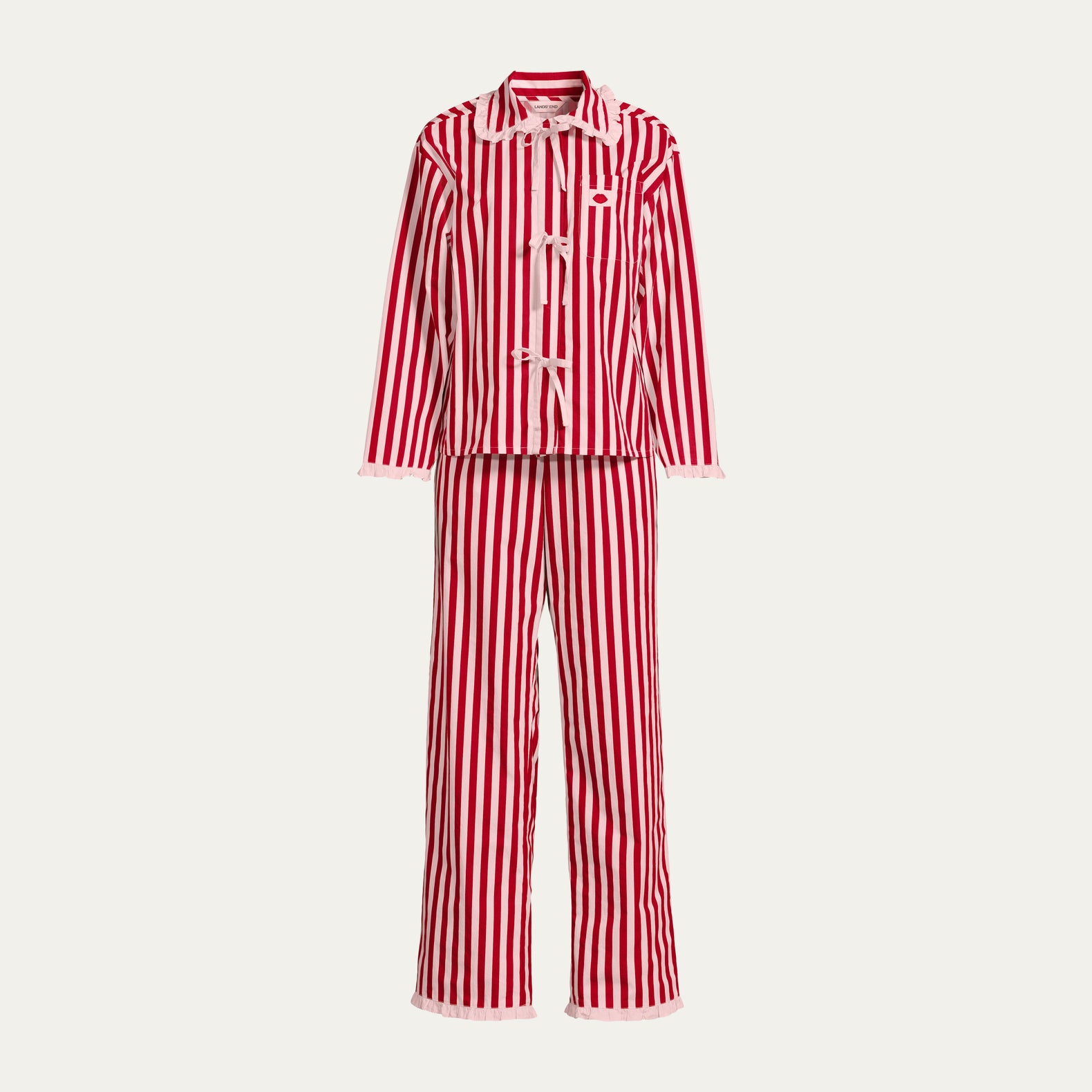 Red and pink striped pyjama set on a light gray background