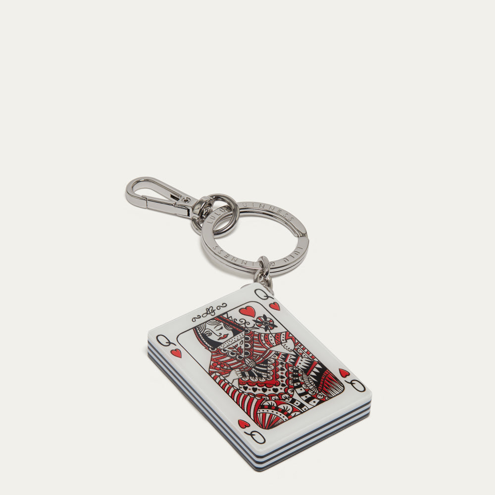 A silver metal keychain featuring a acrylic playing card pendant of the Queen of Hearts, displayed on a clean, light off-white background.