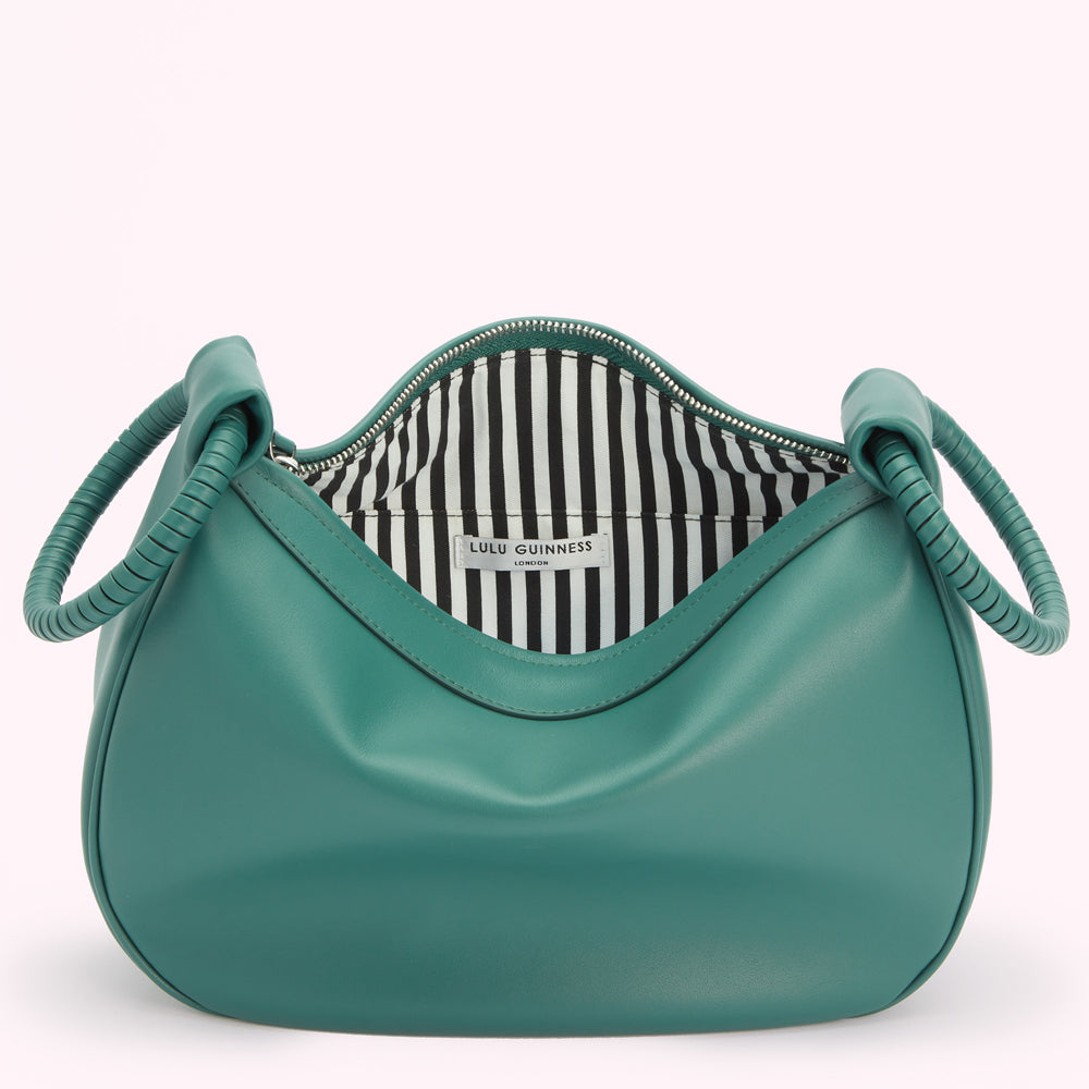 Teal Lulu Guinness London handbag open to reveal black and white striped lining.
