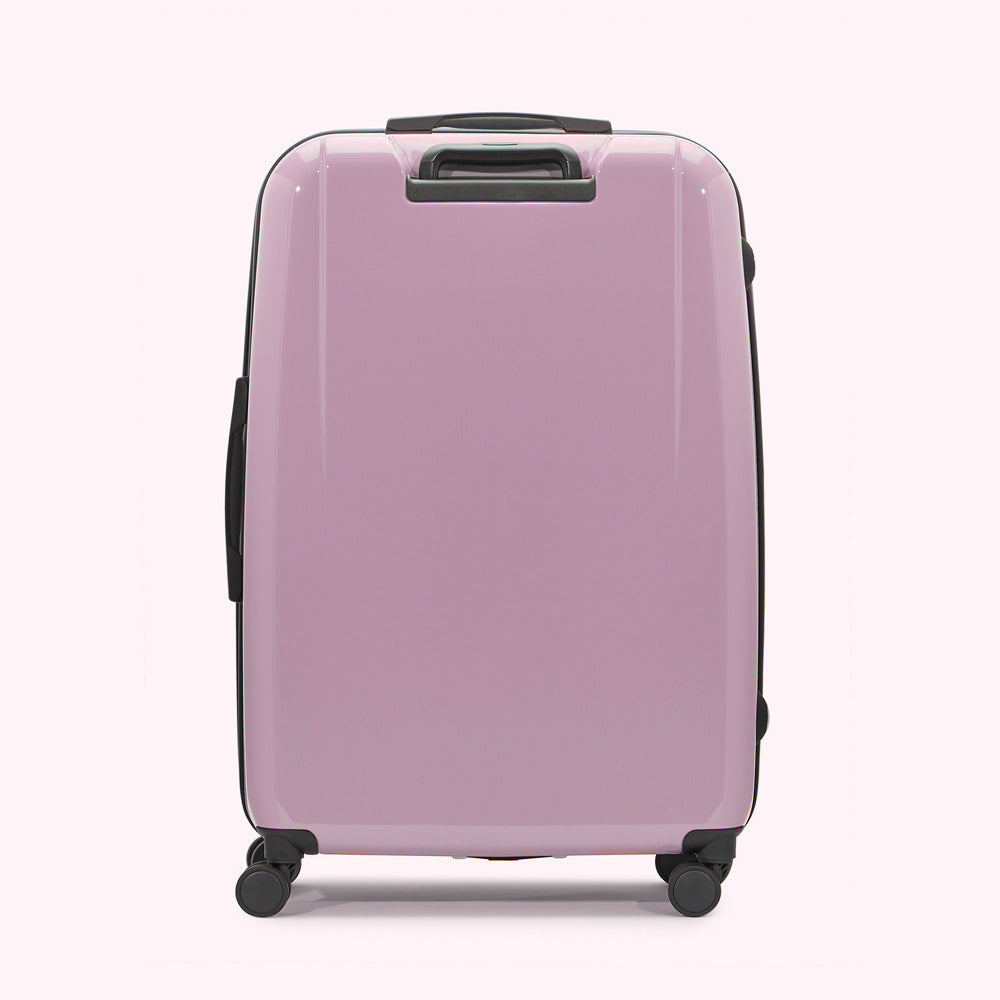A light purple suitcase on a white background.
