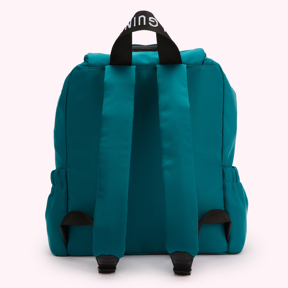 Teal backpack with black straps and "Lulu Guinness" logo on the back.
