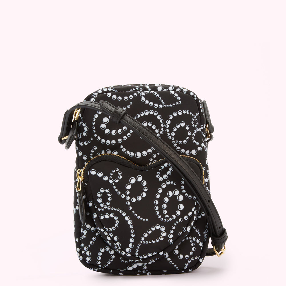 Black crossbody bag with white pearl pattern.
