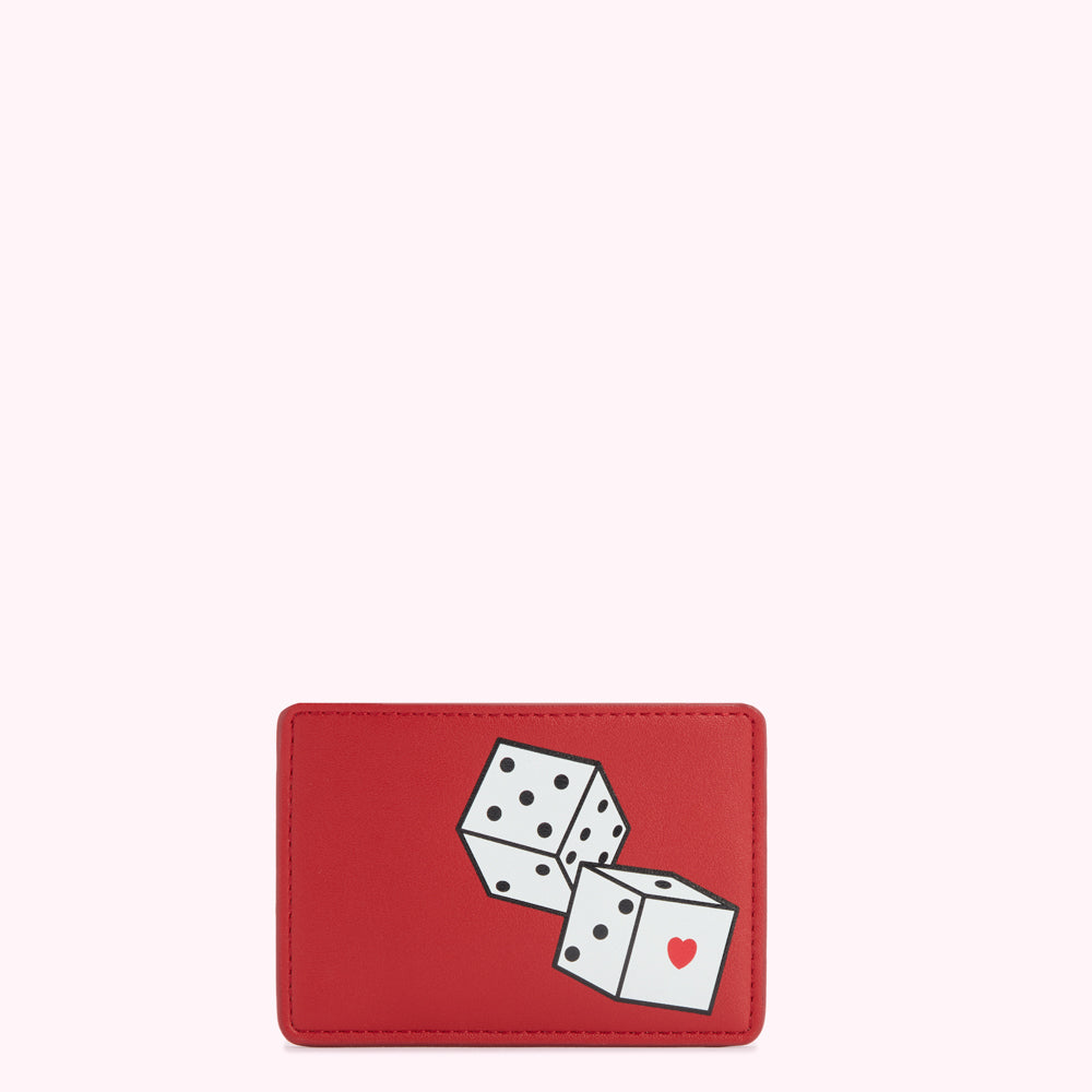 Red leather card holder with a graphic of two dice; one die shows a heart.
