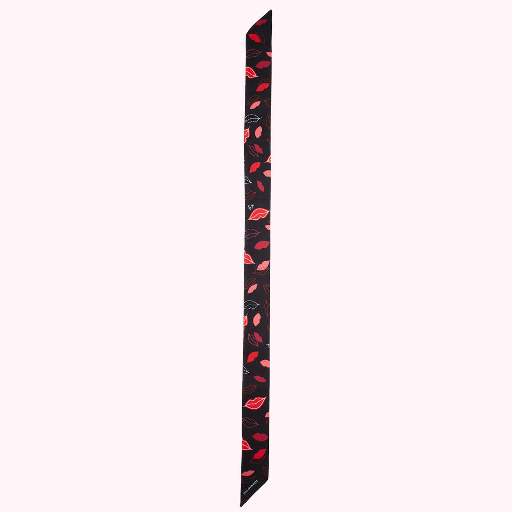 Black silk scarf with a pattern of red lips.