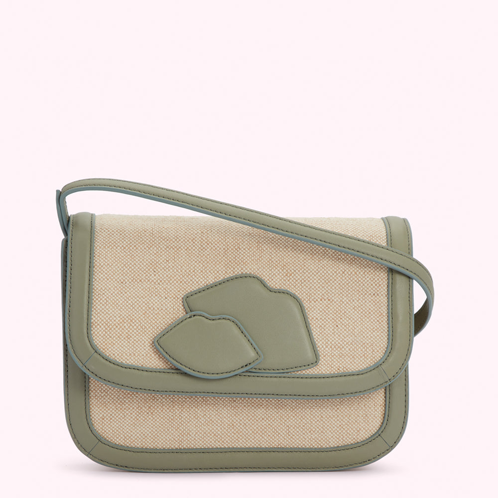 Beige canvas crossbody bag with sage green leather trim and lip detail.