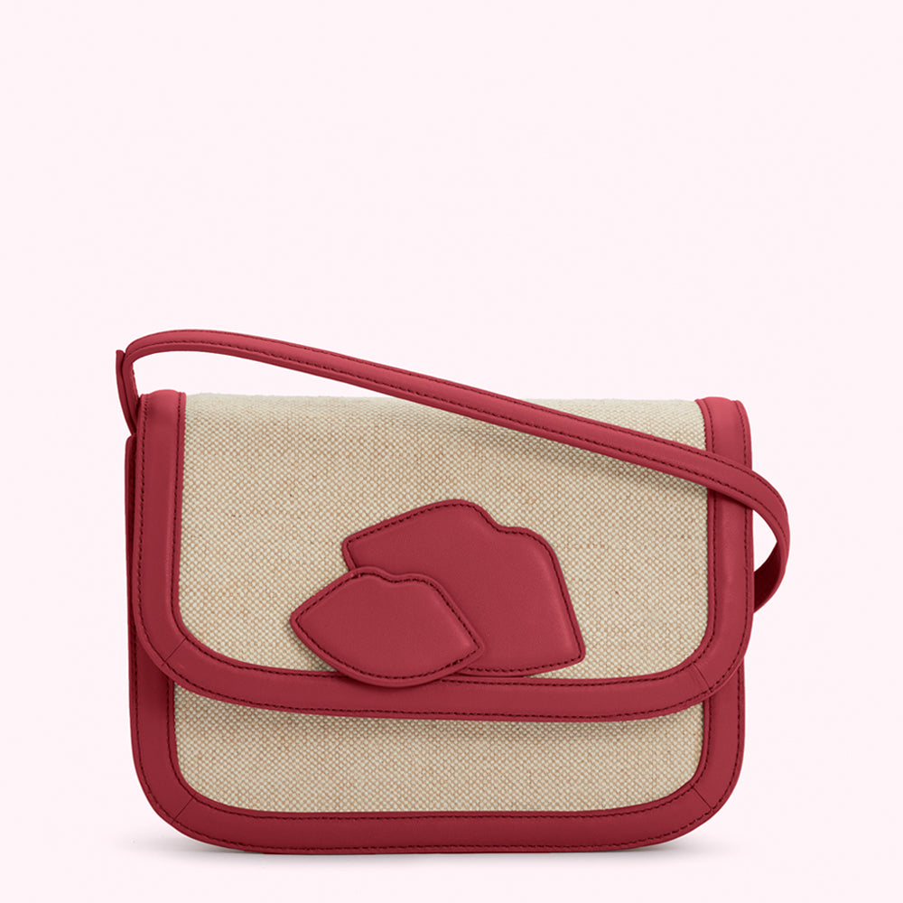 Beige and red crossbody bag with a lip design.