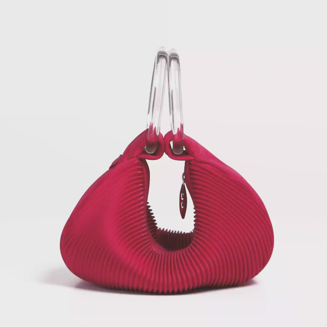 360-degree turntable video showing the full dimensions and angles of the bag. The video is silent and provides a complete visual overview.