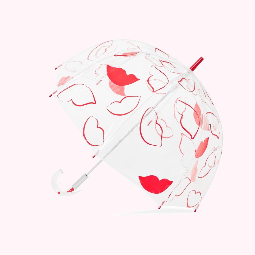 Clear umbrella with a red lip print.
