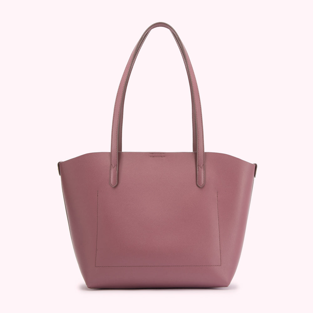 Dusty rose tote bag with two shoulder straps.
