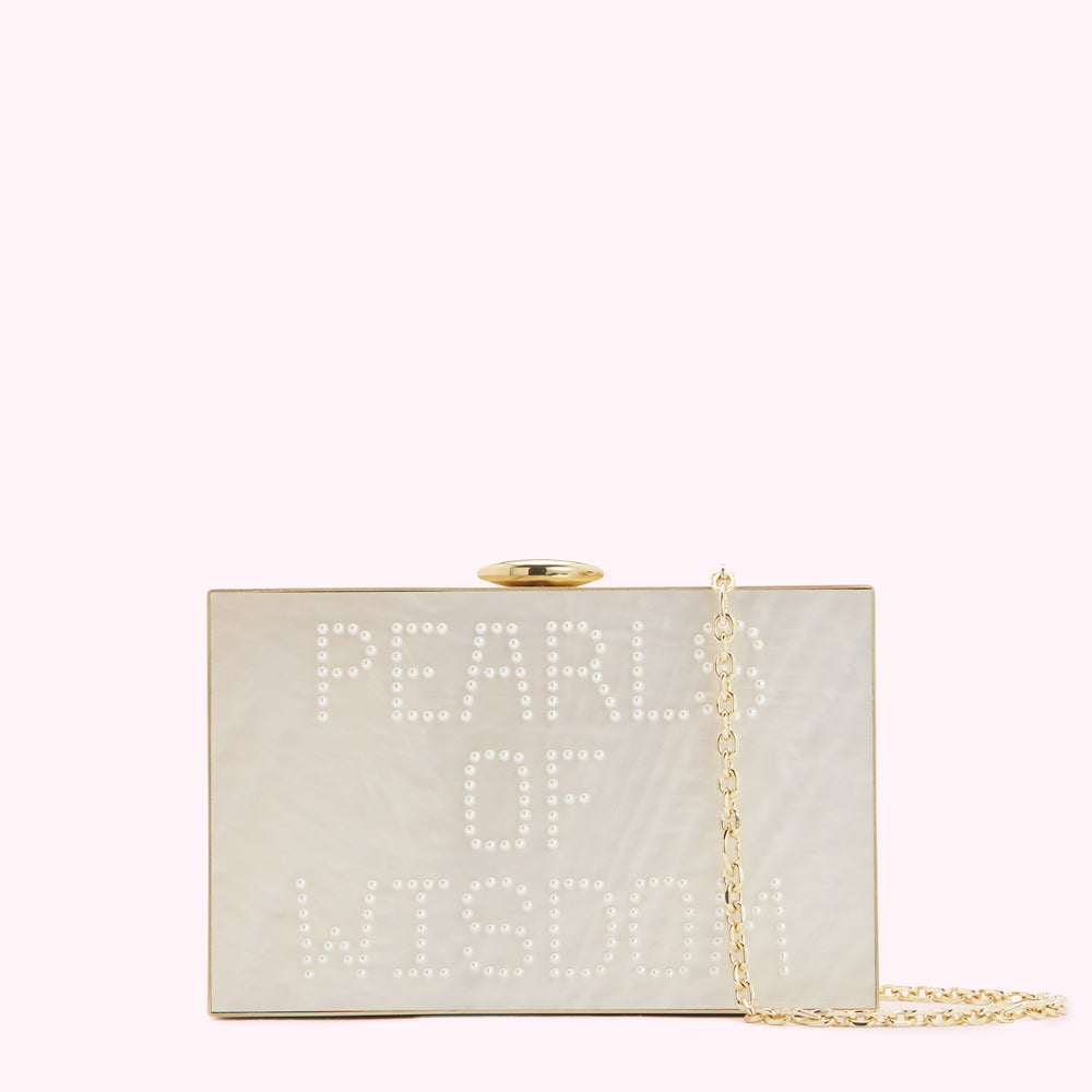 Off-white rectangular clutch with gold clasp and chain strap; the words "Pearls of Wisdom" are spelled out in small pearls.