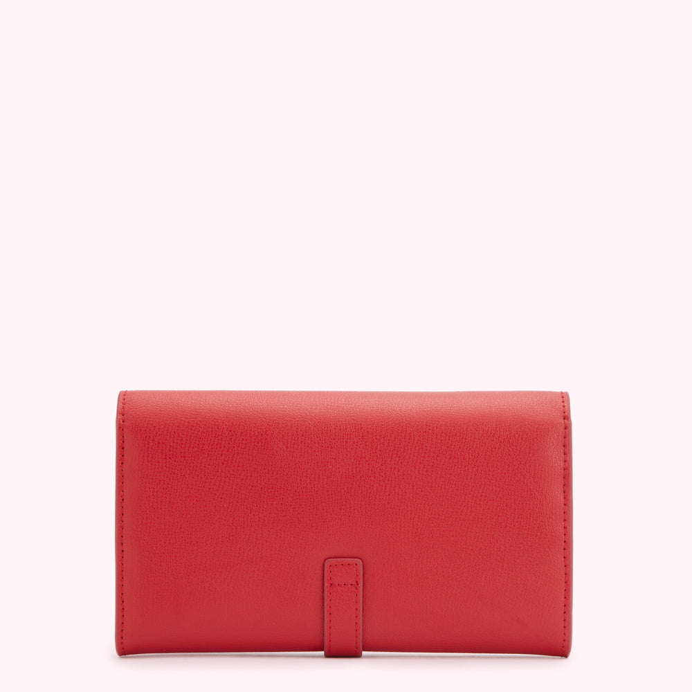 Red leather wallet on a white background.