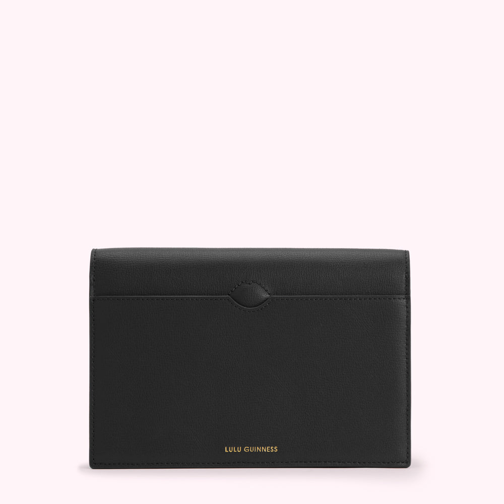 Black Lulu Guinness leather wallet on a white background.
