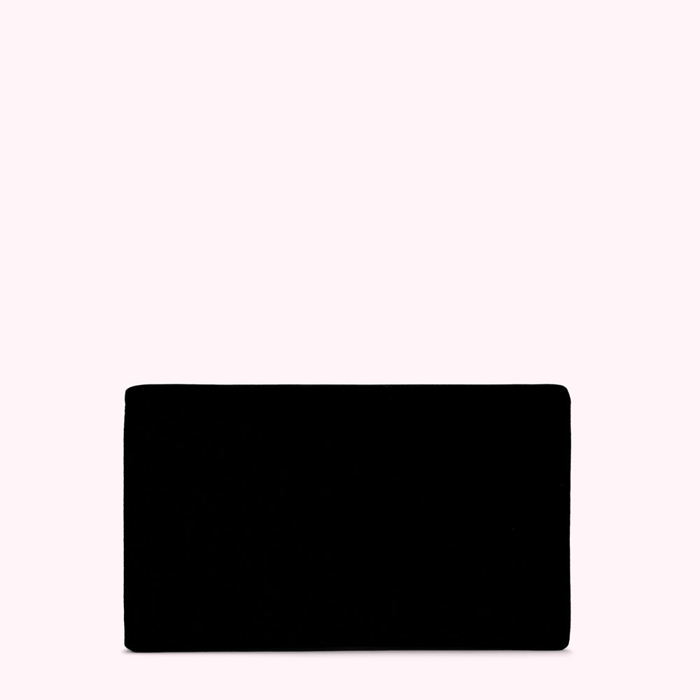 Black rectangular clutch on a white background.

