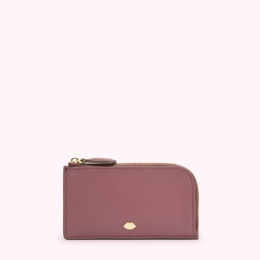 Dusty rose leather zip-around cardholder with gold zipper and logo.
