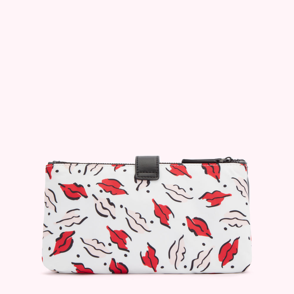 White zippered pouch with red lips print on a white background.