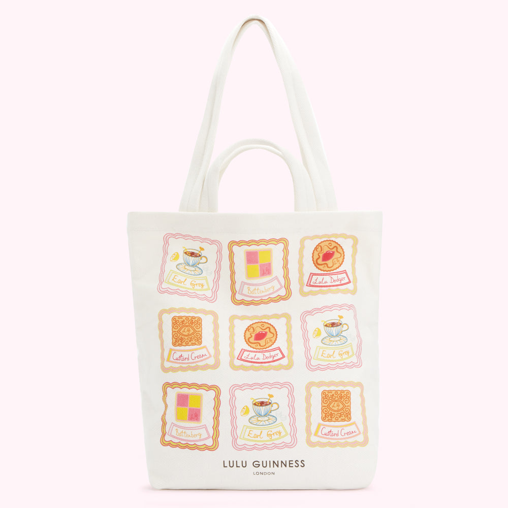 White tote bag with illustrations of biscuits and teacups; Lulu Guinness London.