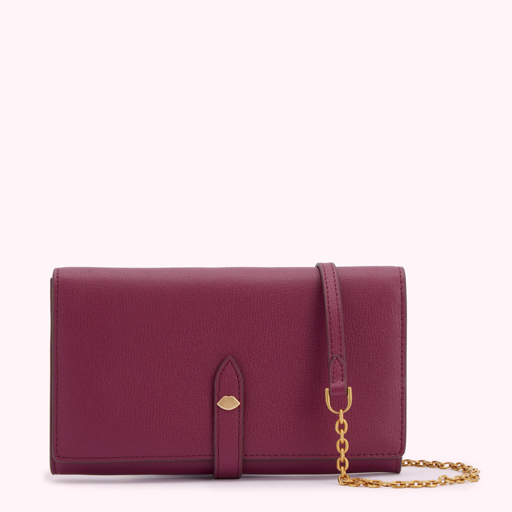 Burgundy leather wallet with gold chain strap and clasp.
