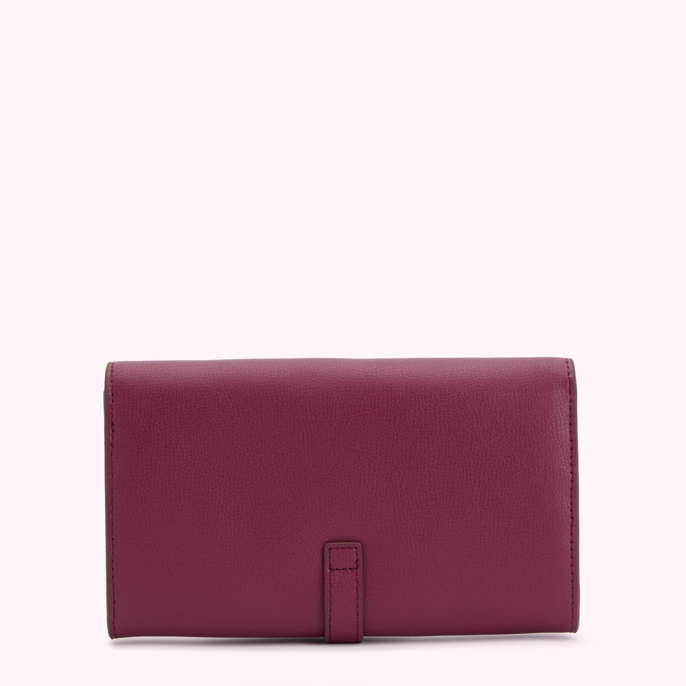 Burgundy leather wallet on white background.
