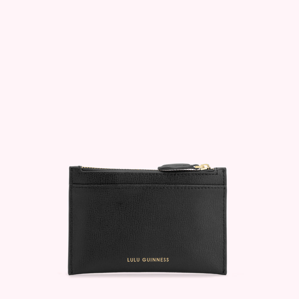 Black Lulu Guinness zip-around cardholder against a white background.
