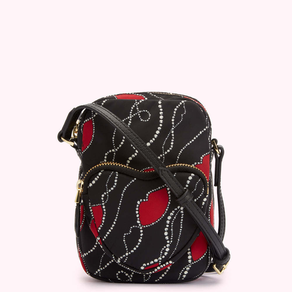 Black crossbody bag with red lips and pearl pattern.