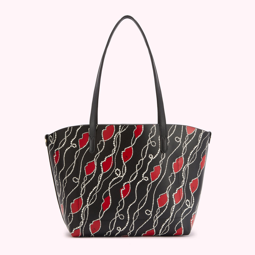Black tote bag with red lips and pearl details on a white background.