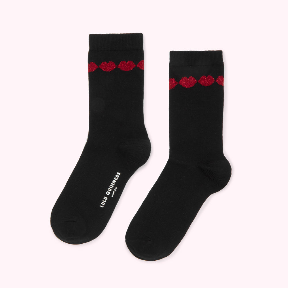 Pair of black Lulu Guinness socks with red glitter lips detail.
