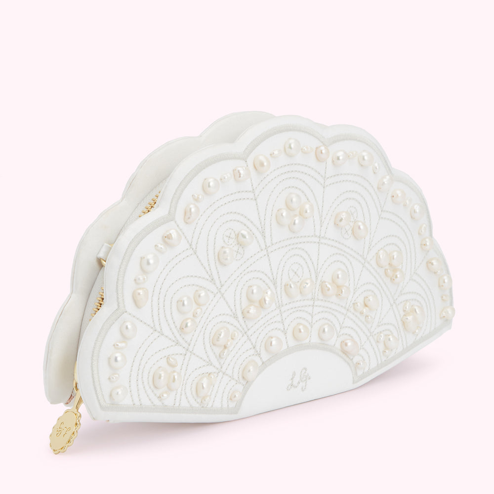 White fan-shaped clutch adorned with pearls.
