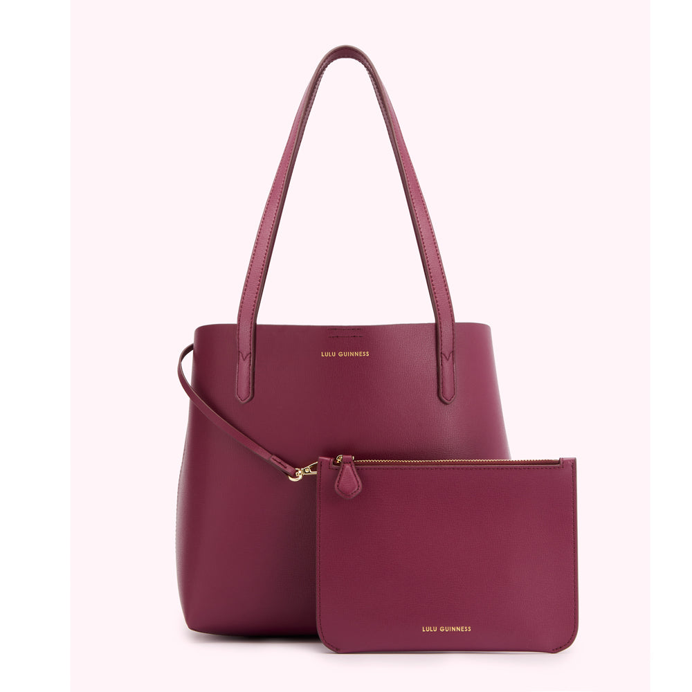 Burgundy Lulu Guinness tote bag with matching zip pouch.
