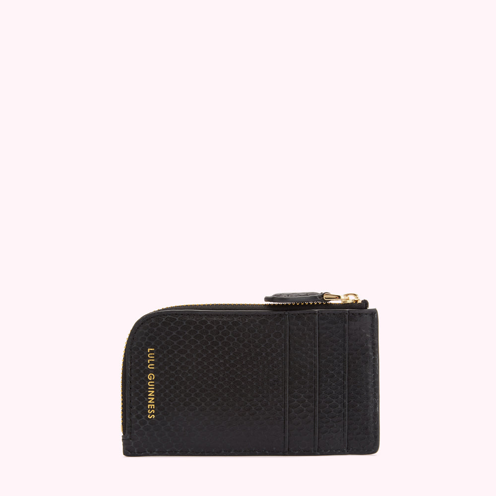 Black Lulu Guinness zip-around cardholder on white background.
