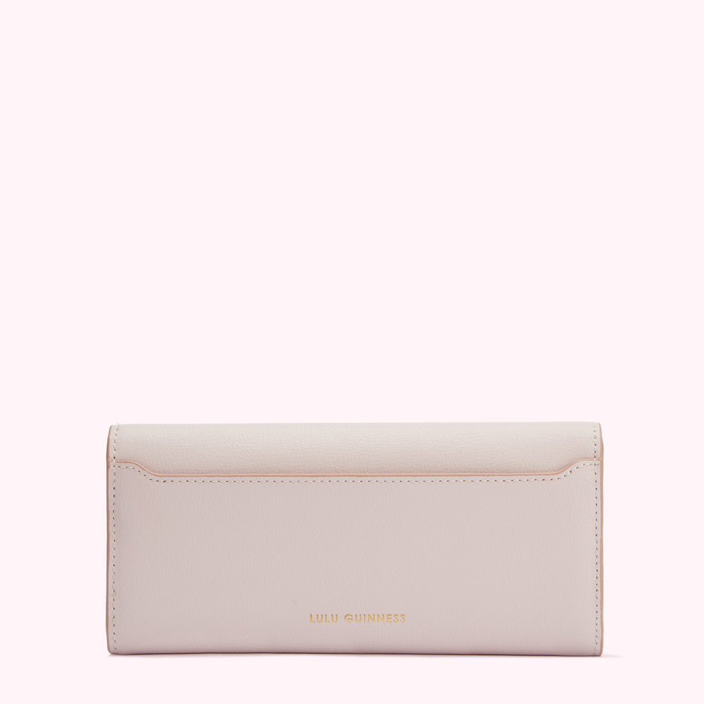 Light pink Lulu Guinness wallet, back view.
