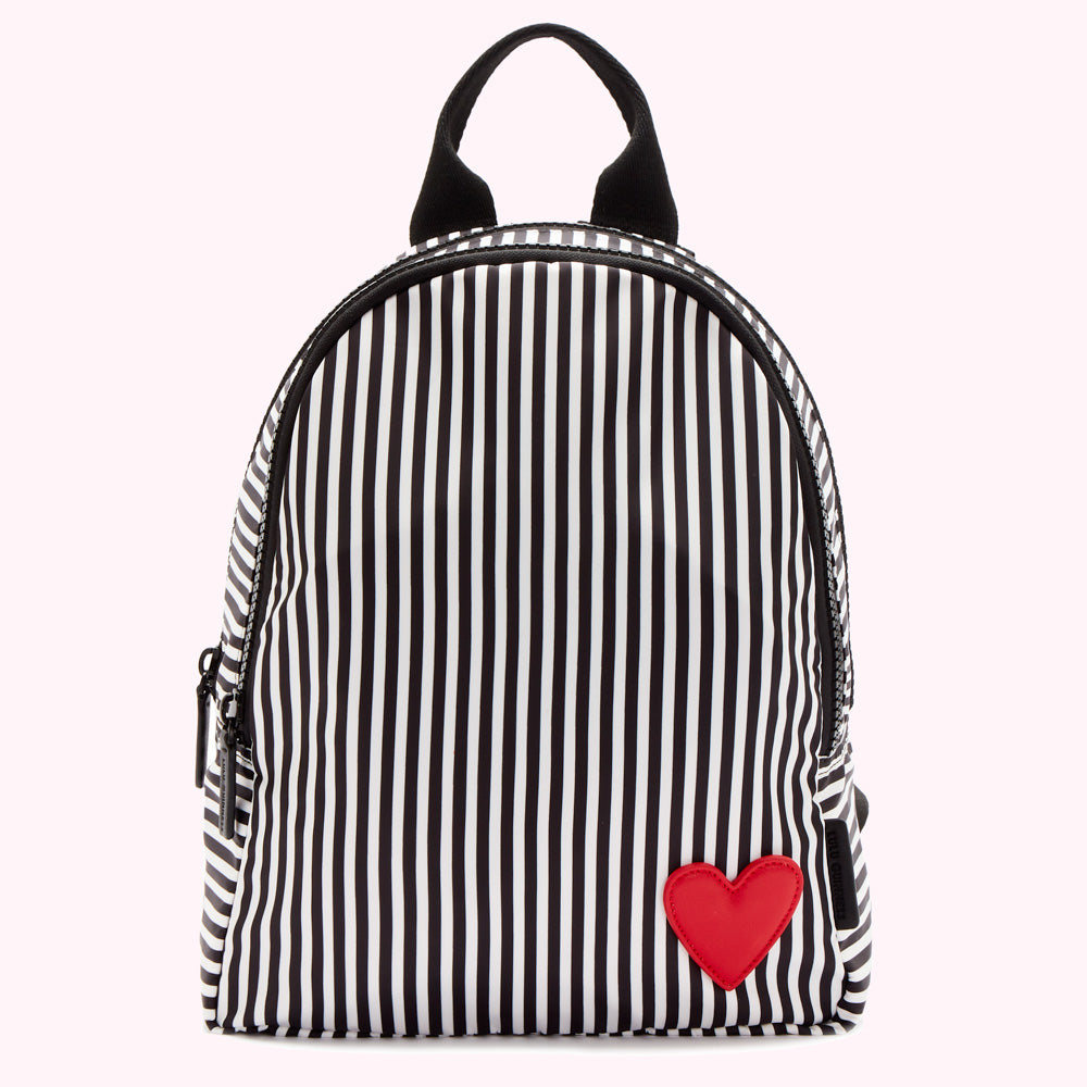 Black and white striped backpack with a red heart detail.