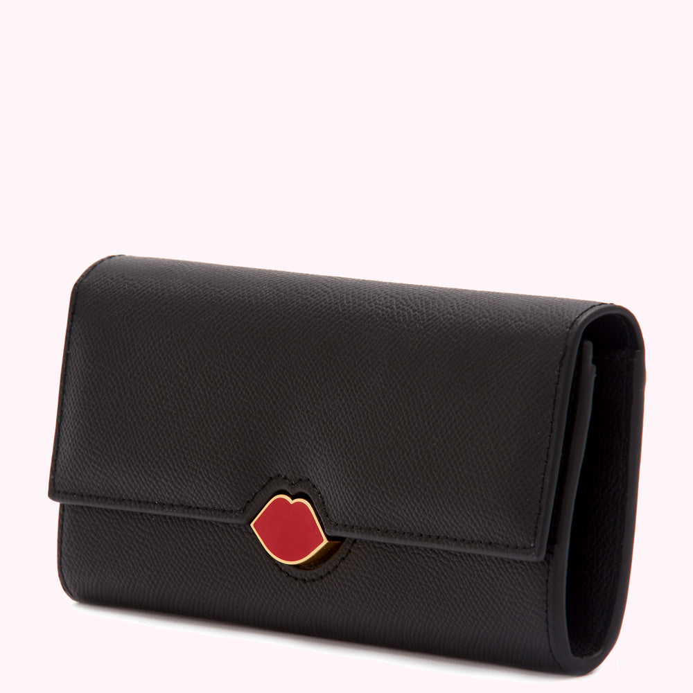 Black leather wallet with a red lip detail.
