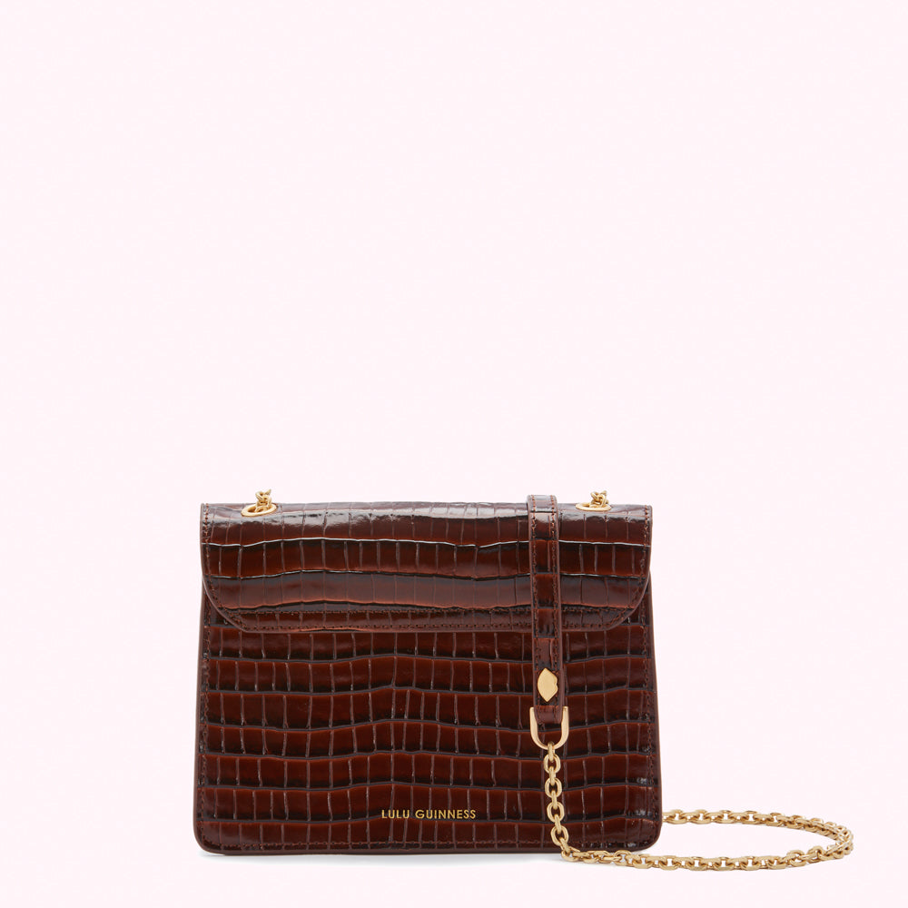 Brown crocodile-embossed leather Lulu Guinness shoulder bag with gold chain strap.
