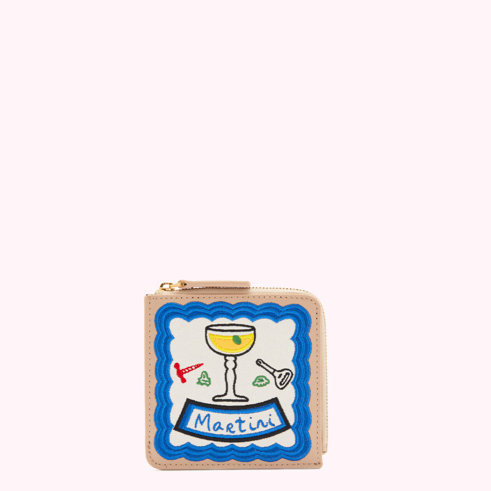 Beige zip-around wallet with embroidered martini design.