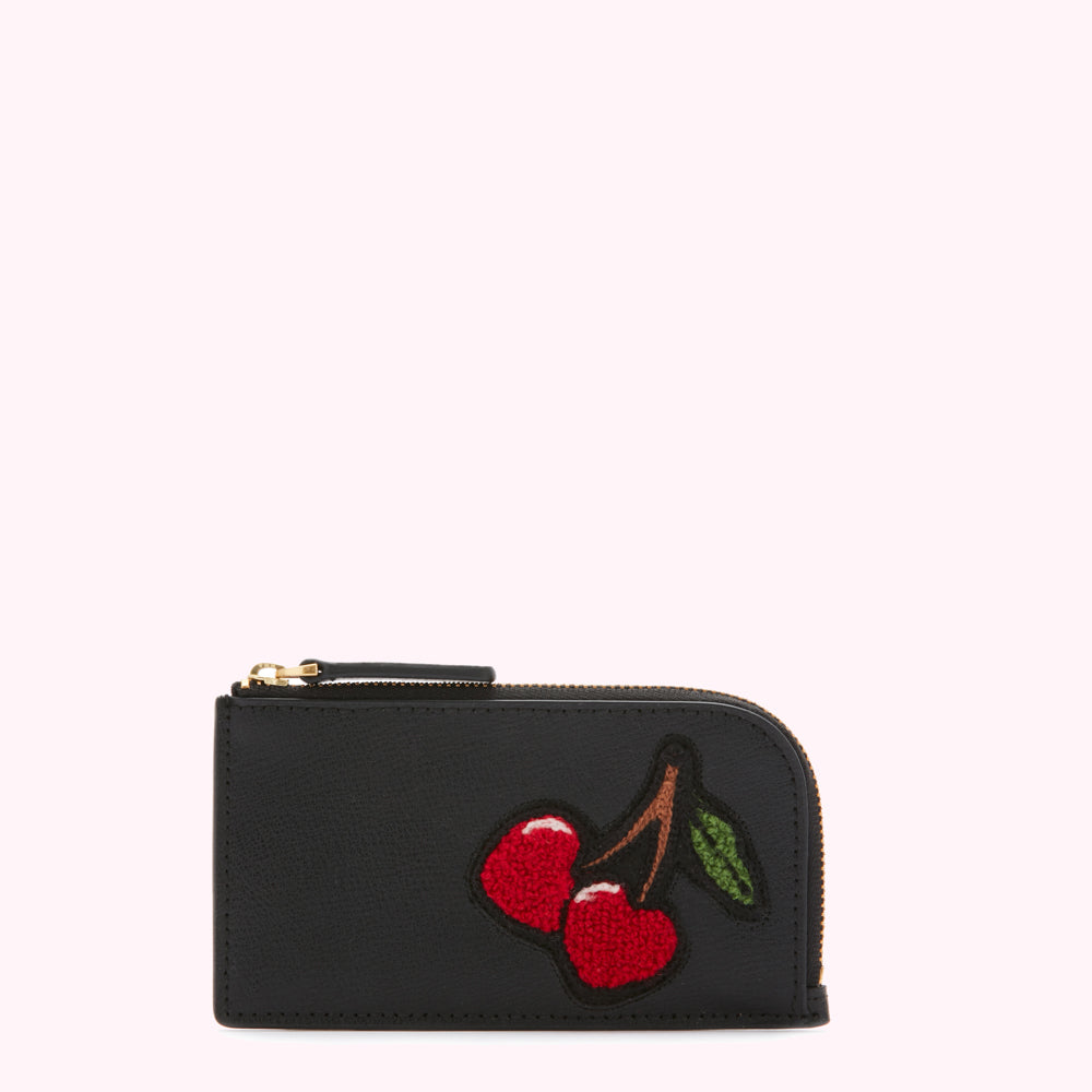 Black leather cardholder with embroidered cherries.
