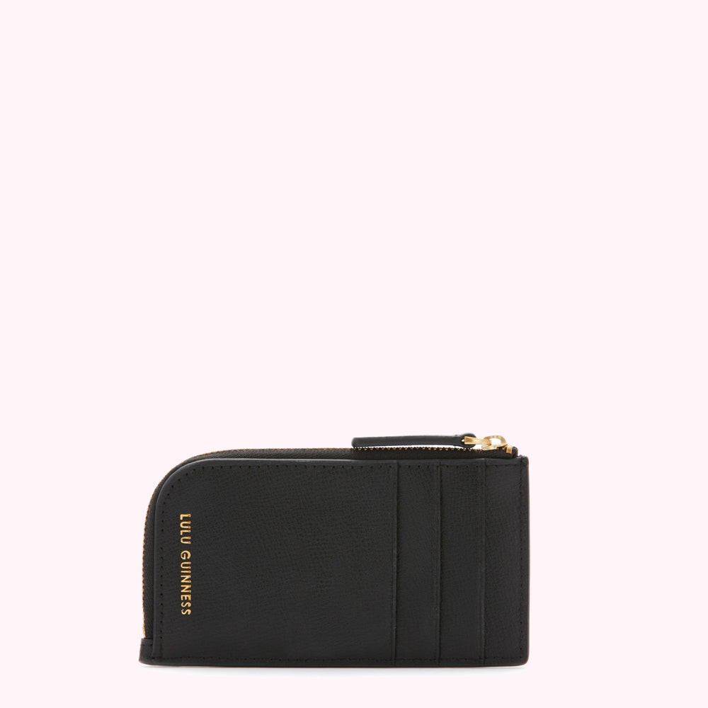 Black Lulu Guinness zip-around cardholder on white background.