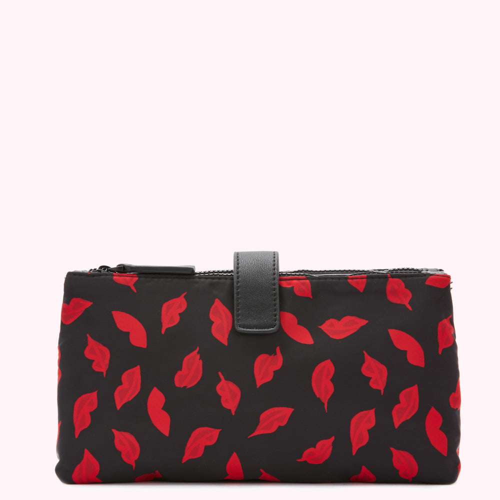 Black cosmetic bag with red lips print.