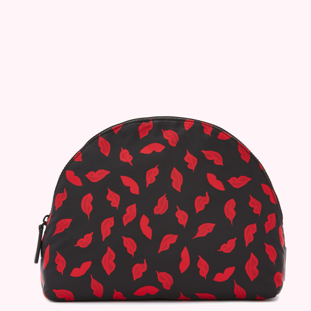 Black half-moon shaped cosmetic bag with red lips print.