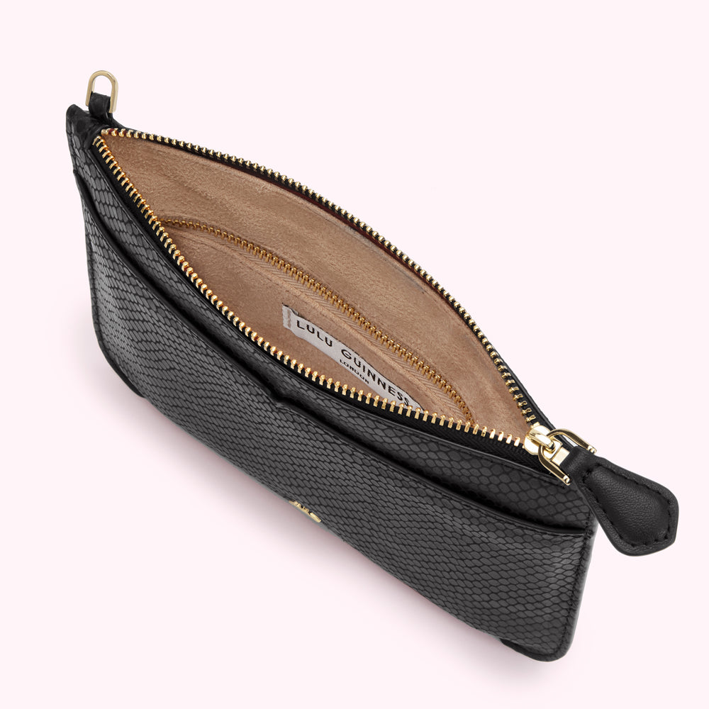 Open black Lulu Guinness zip-around pouch with beige lining and gold zipper.
