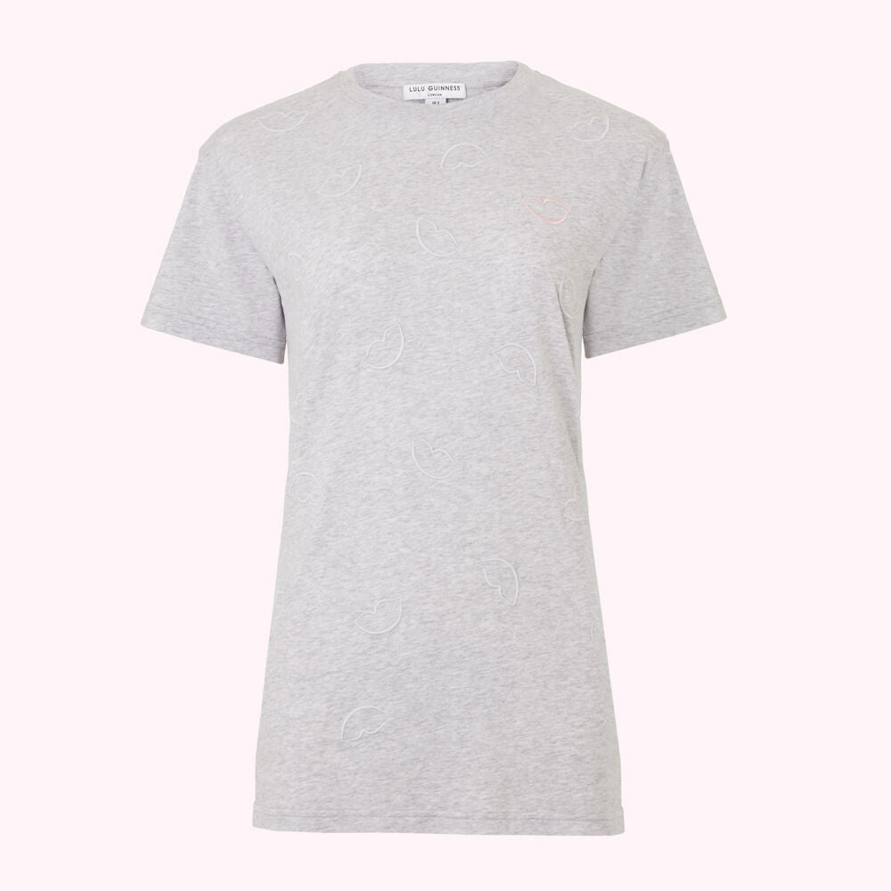 Grey short-sleeved t-shirt with an embroidered lip pattern.