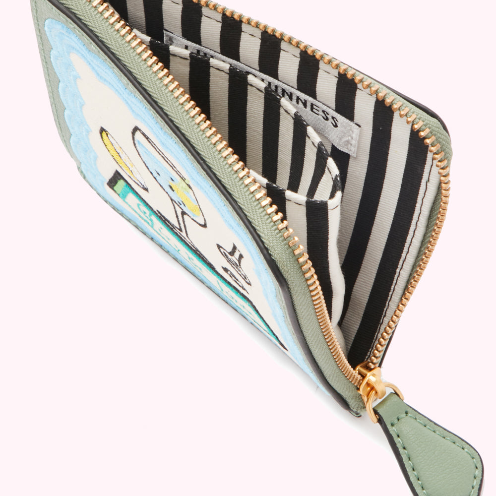 Sage green zip-around wallet with a whimsical embroidered design and black and white striped interior.
