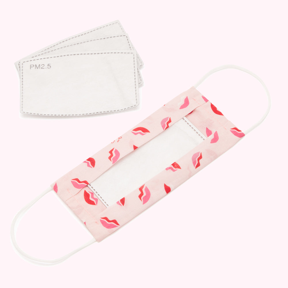 Pink face mask with red lips pattern and three PM2.5 filters.
