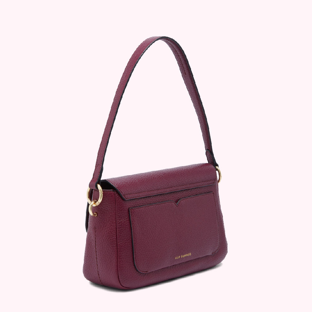 Burgundy leather shoulder bag with gold hardware.