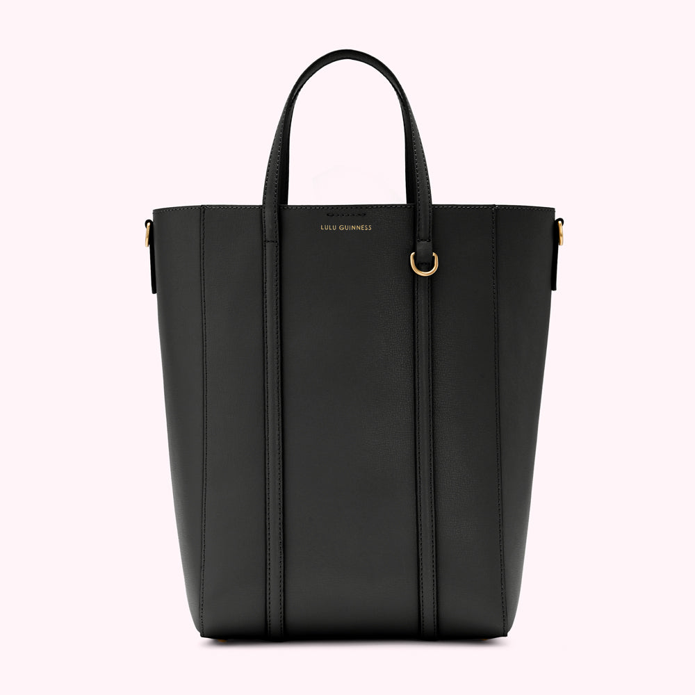 Black Lulu Guinness tote bag with gold hardware.
