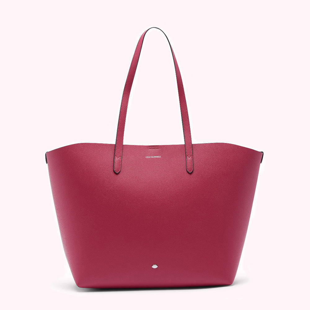 Crimson Lulu Guinness tote bag on a white background.
