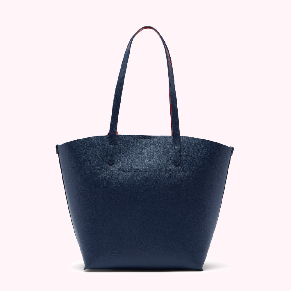 Navy blue tote bag with red accents on the straps.

