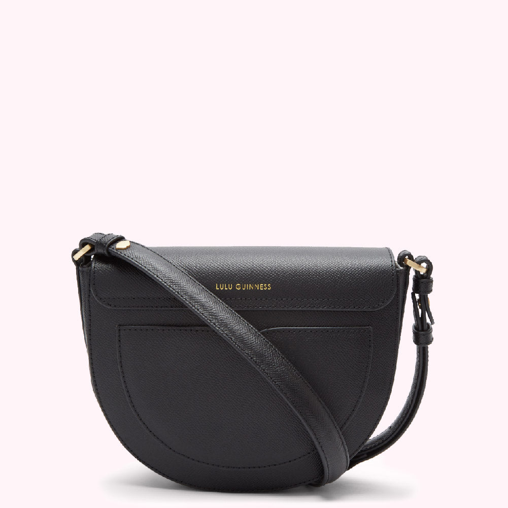 Black Lulu Guinness crescent crossbody bag with gold hardware.
