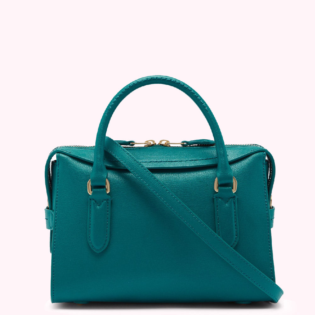 Teal leather handbag with gold-tone hardware and a shoulder strap.
