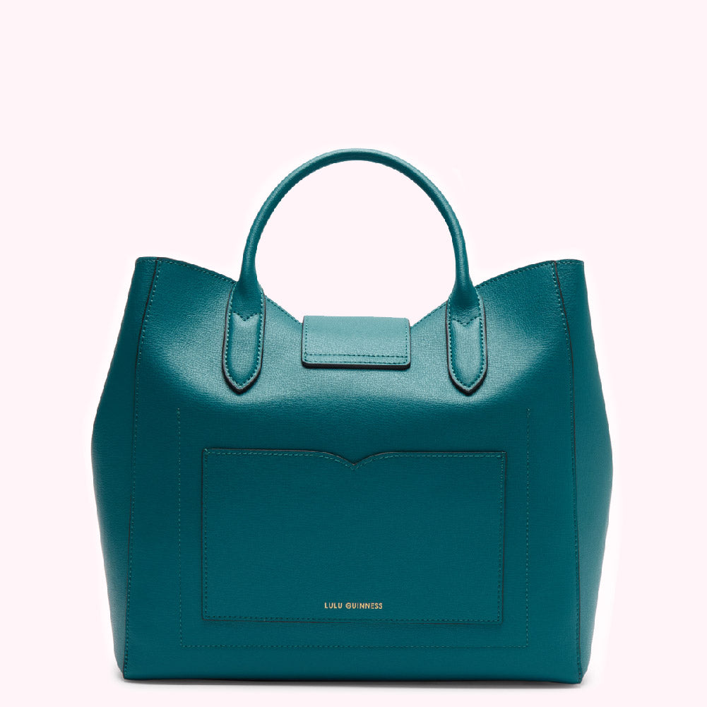 Teal Lulu Guinness tote bag with a back pocket and gold logo.
